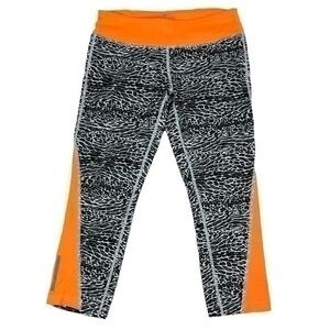 Nike Dri-Fit Women Cropped Leggings Medium | Black White Orange